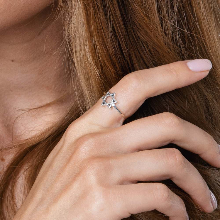 woman wearing Star of David ring