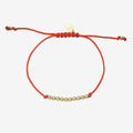 14K Gold Bead Row Fortune Bracelet with red cord by Zoe Lev
