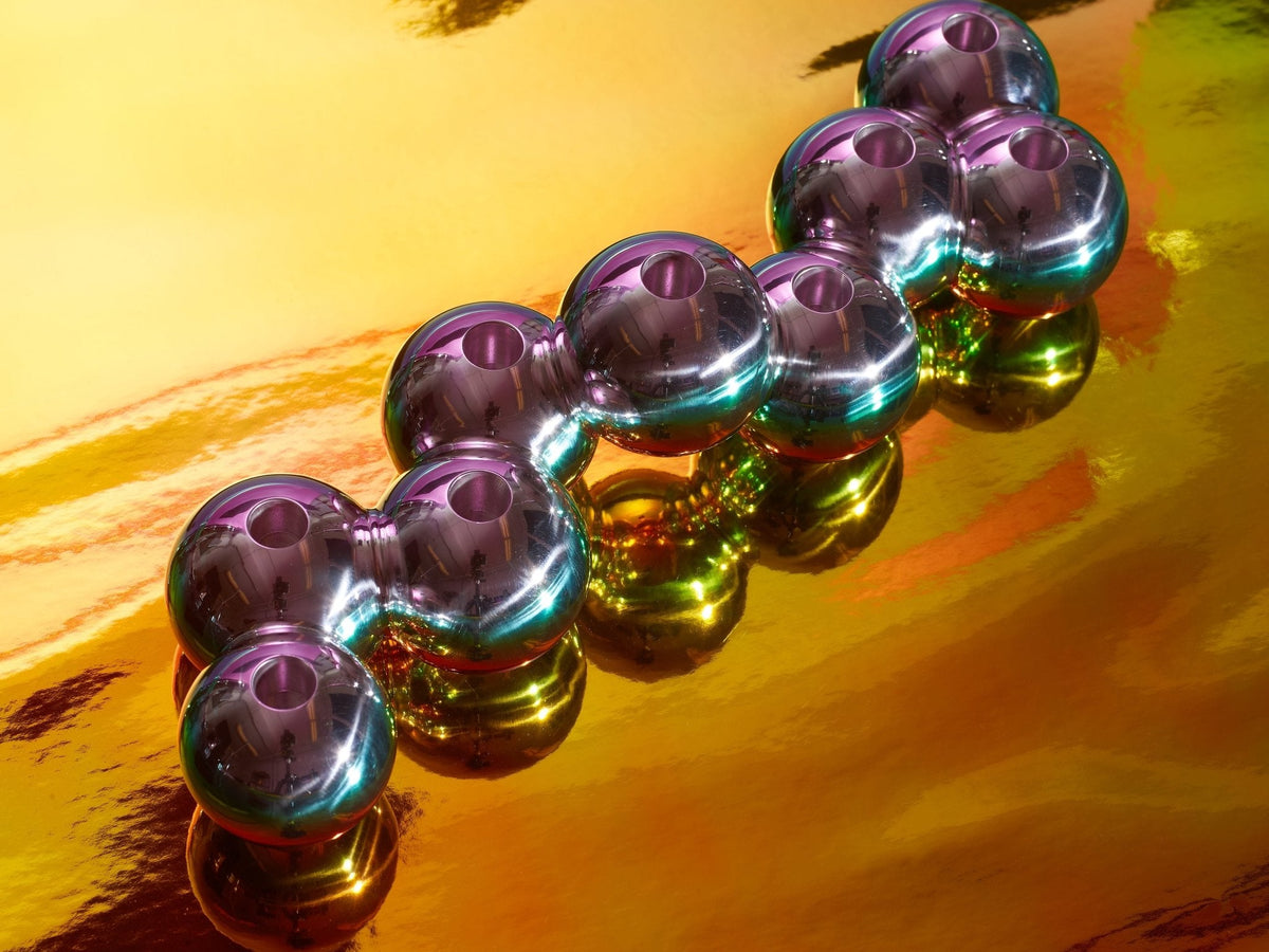 Close-up of the color-shifting Iridescent Aluminum Bubble Menorah by Tchotchke