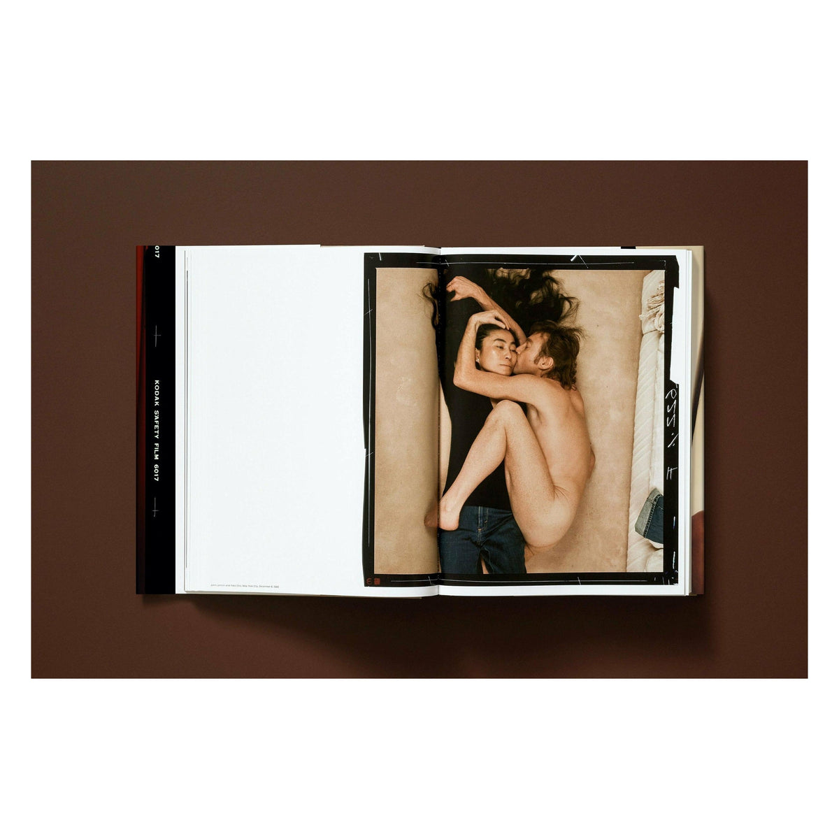Annie Leibovitz photography book open to her 1980 portrait of John Lennon and Yoko Ono