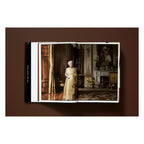 Annie Leibovitz photography book open to her portrait of Queen Elizabeth II at Buckingham Palace