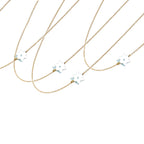 Asymmetrical Diamond Star of David necklaces styled in two-tone finish