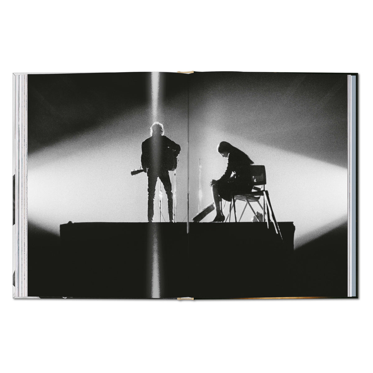 Daniel Kramer photograph of Bob Dylan and Joan Baez silhouetted onstage