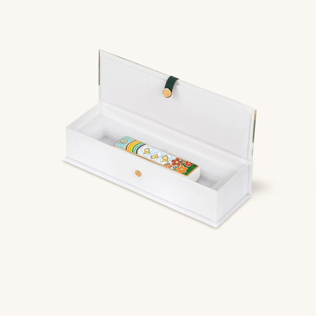 Bright Beginnings rainbow ceramic mezuzah presented inside an open gift box
