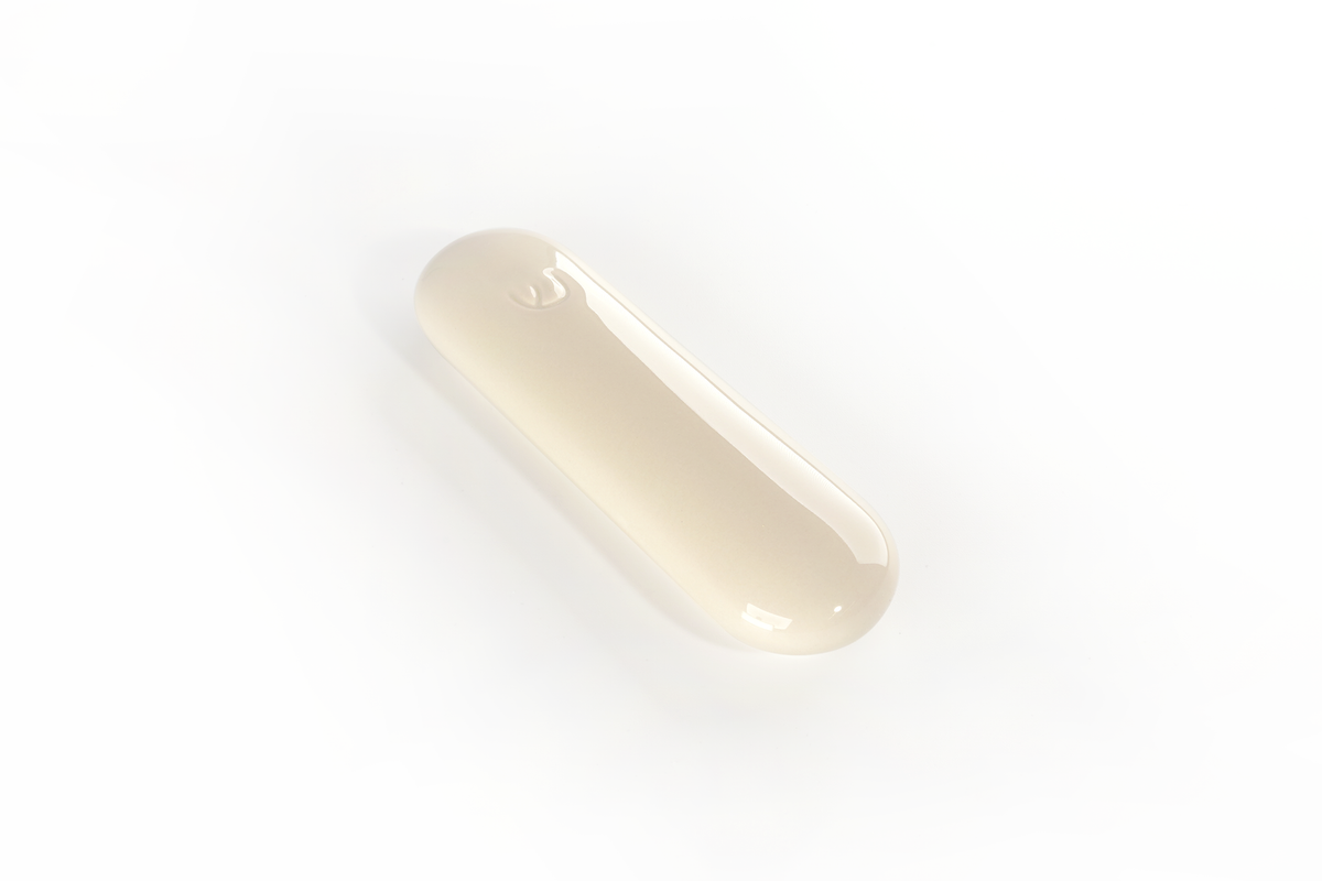Cream Ceramic Pill Mezuzah by Tchotchke