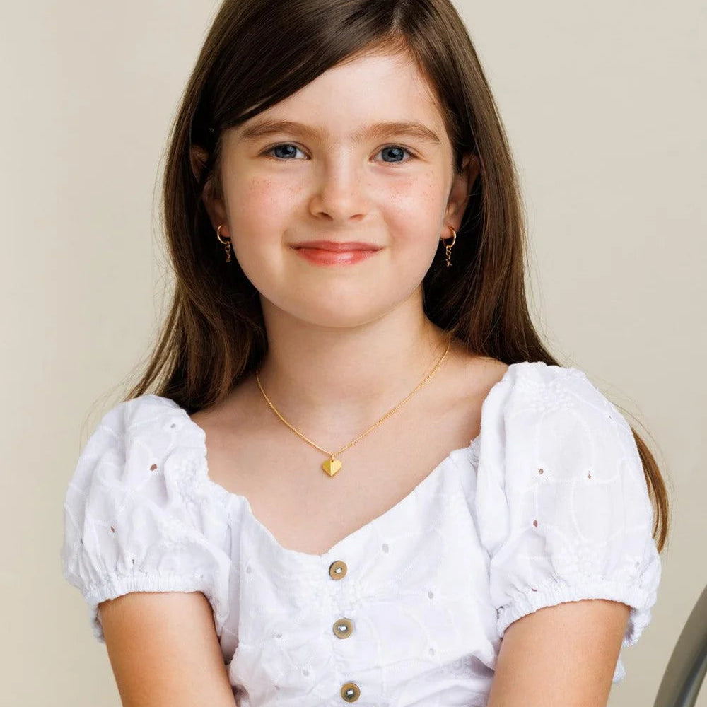 Child Tiny Origami Heart Necklace worn by a girl