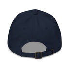 Back view of navy Abba dad hat with adjustable strap and metal buckle
