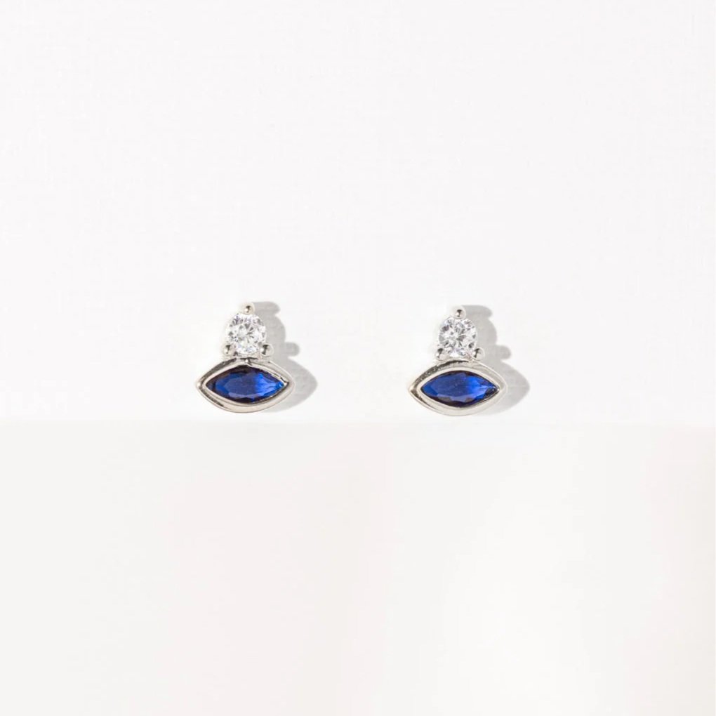 Silver Cosmic Evil Eye Earrings with blue and clear stones by Shlomit Ofir