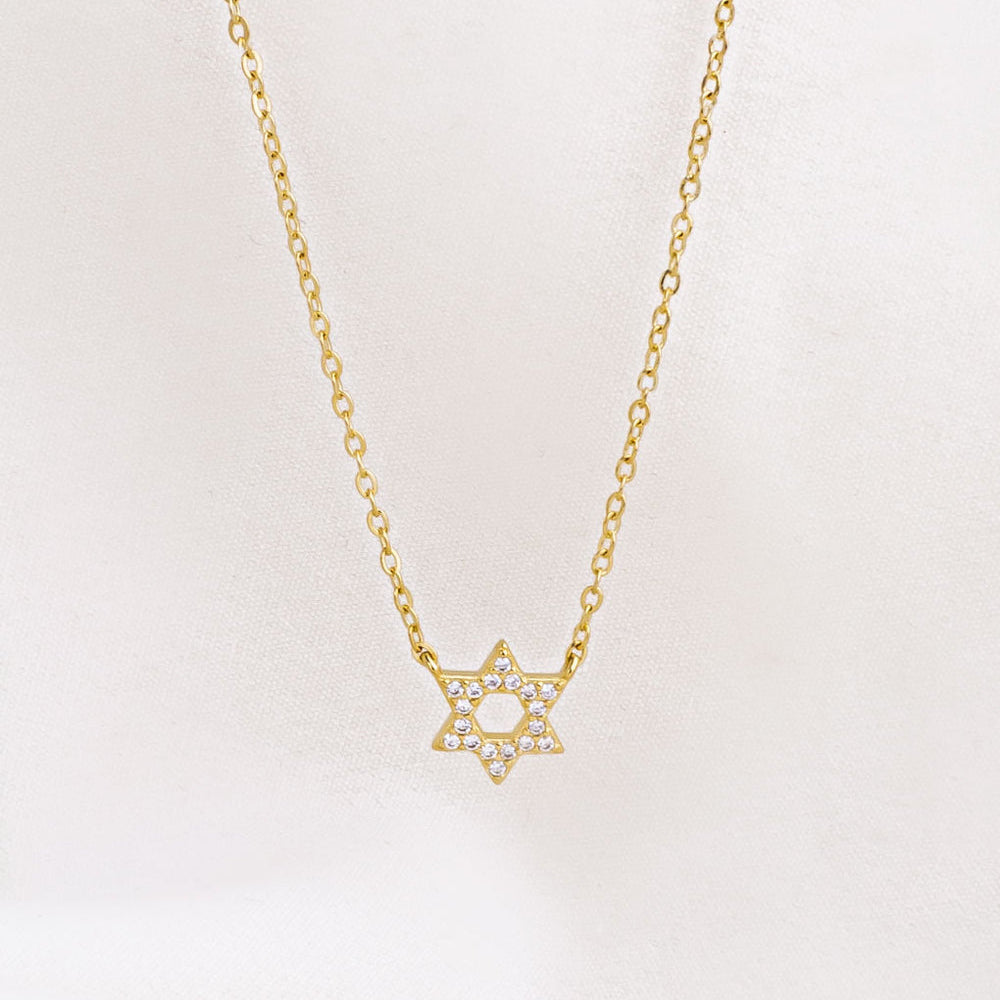 Gold-plated Crystal Set Star of David Necklace by Shlomit Ofir, featuring a petite Magen David pendant with clear crystals on a delicate chain.