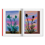 David Hockney My Window art book open to two colorful digital drawings of plants against changing skies