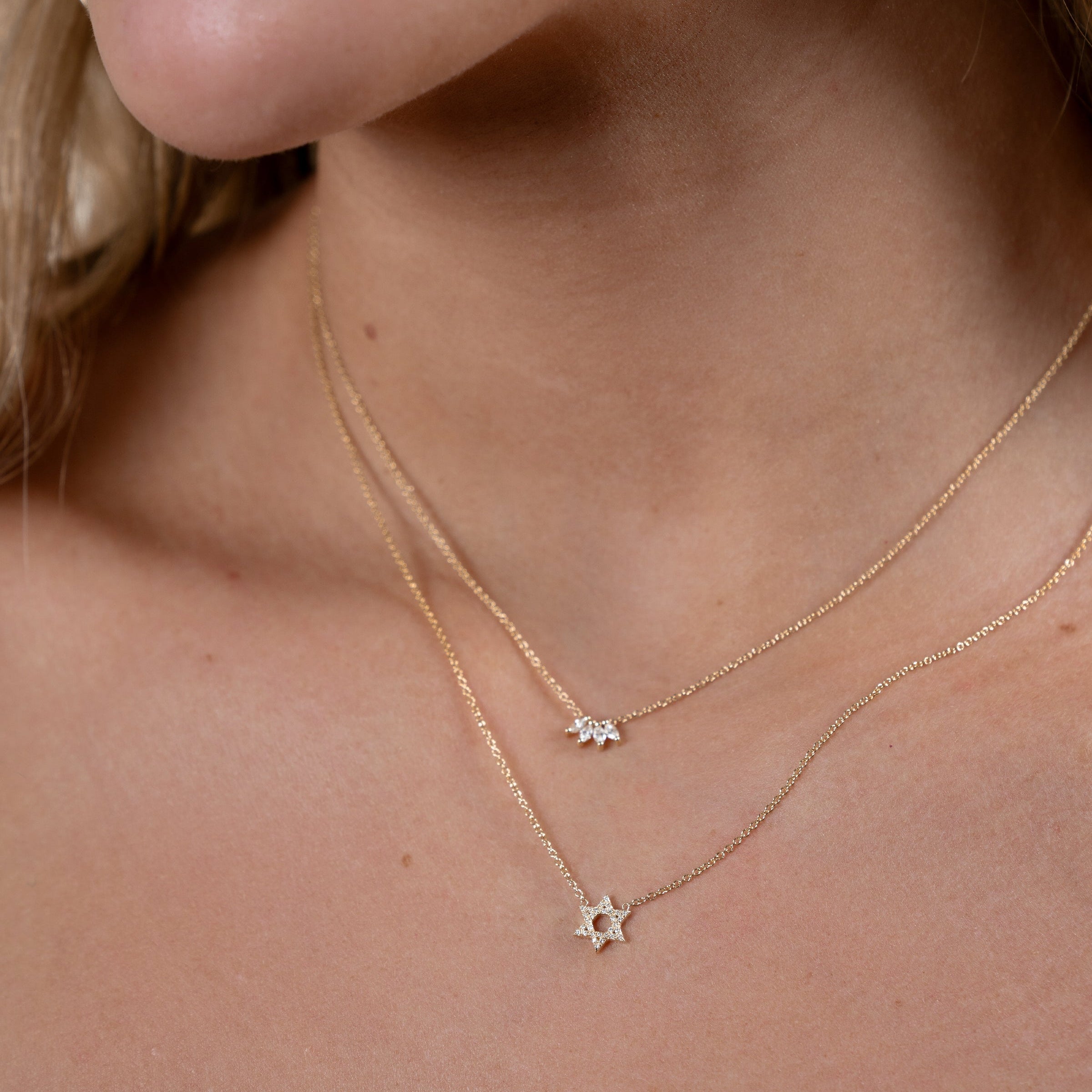 Diamond Open Star of David Necklace layered with a delicate gold necklace