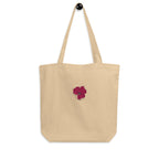 Natural canvas tote bag with embroidered magenta poppy design