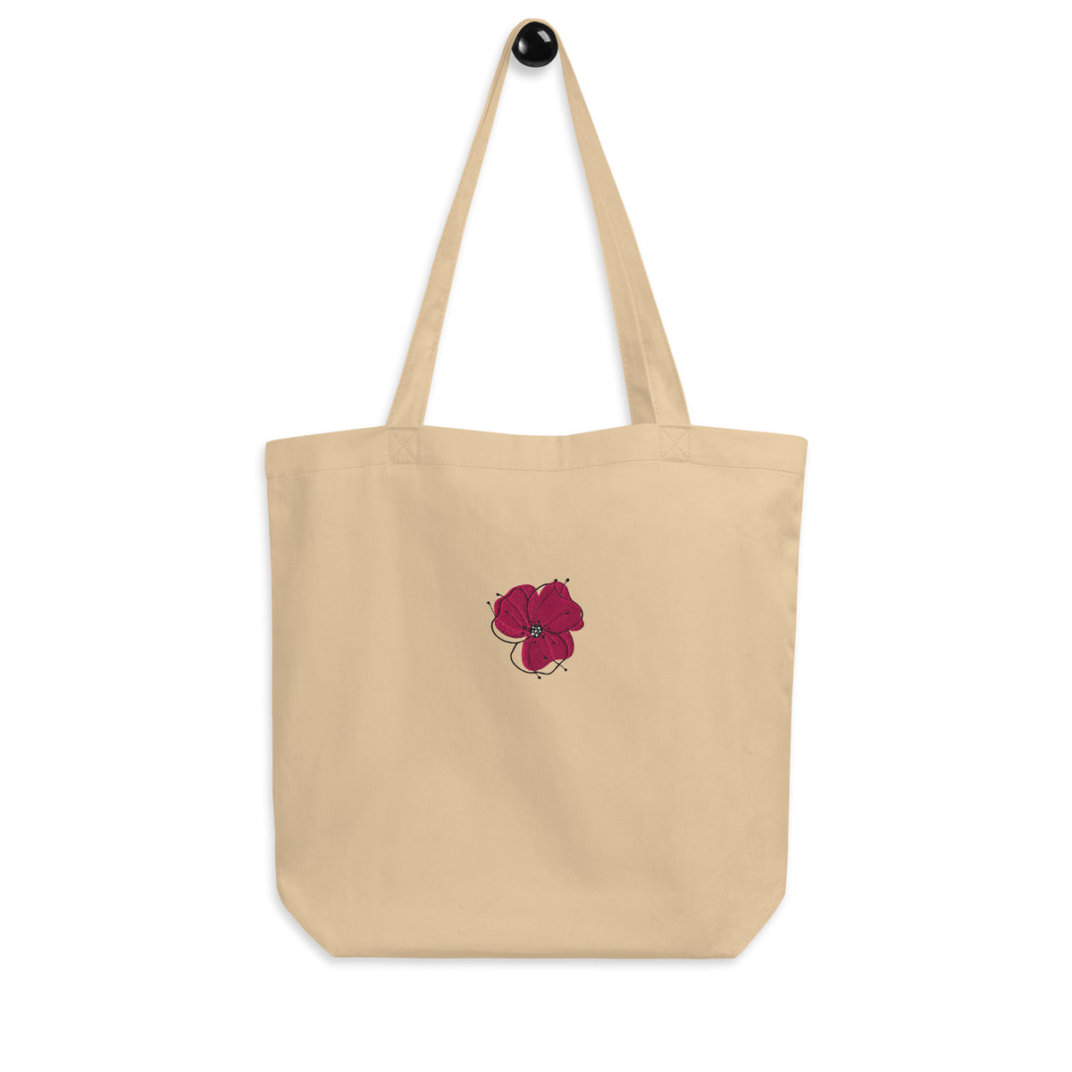 Natural canvas tote bag with embroidered magenta poppy design