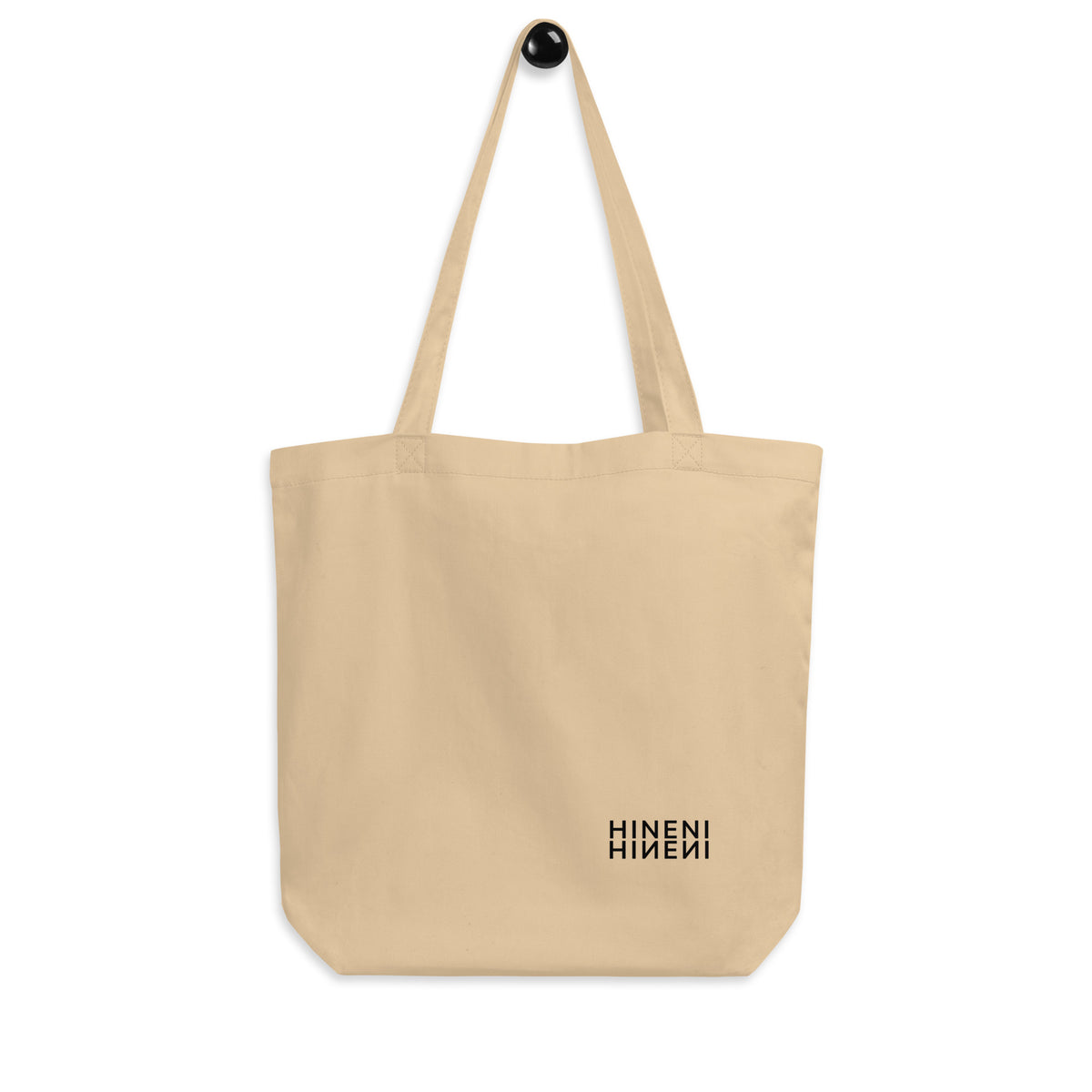 Hineni Mirrored organic cotton tote bag in natural Oyster canvas with black mirrored Hineni design