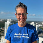 Eitan Chitayat wearing the Smallest Nation. Largest Family. T-Shirt in Tel Aviv