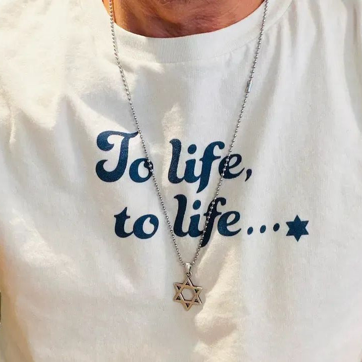 Eitan Chitayat wearing the To Life, To Life T-Shirt