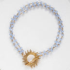 Blue Glory Bracelet with gold starburst pendant by Shlomit Ofir