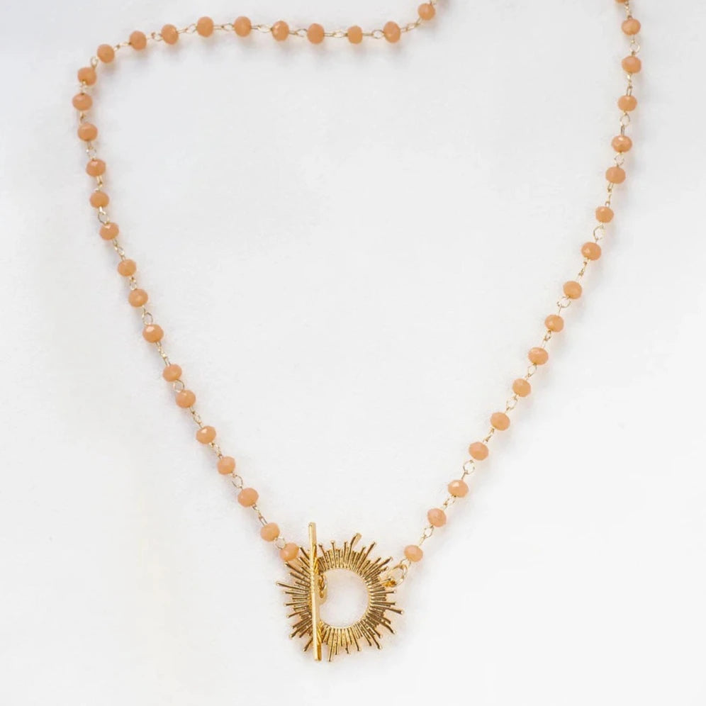 Pink Glory Necklace with gold starburst pendant by Shlomit Ofir