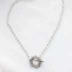 White Glory Necklace with silver starburst pendant by Shlomit Ofir