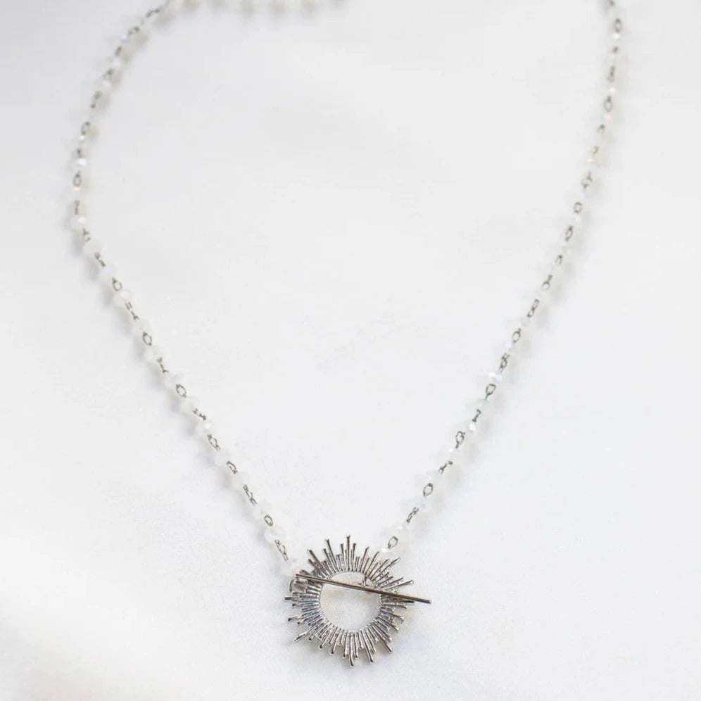 White Glory Necklace with silver starburst pendant by Shlomit Ofir