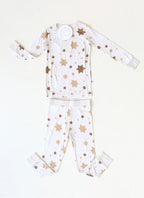 Golden Hour Hanukkah two-piece pajama set with gold Star of David print, shown flat.