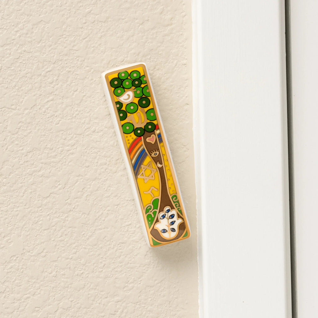 Grounded Presence Tree of Life ceramic mezuzah mounted on a doorway