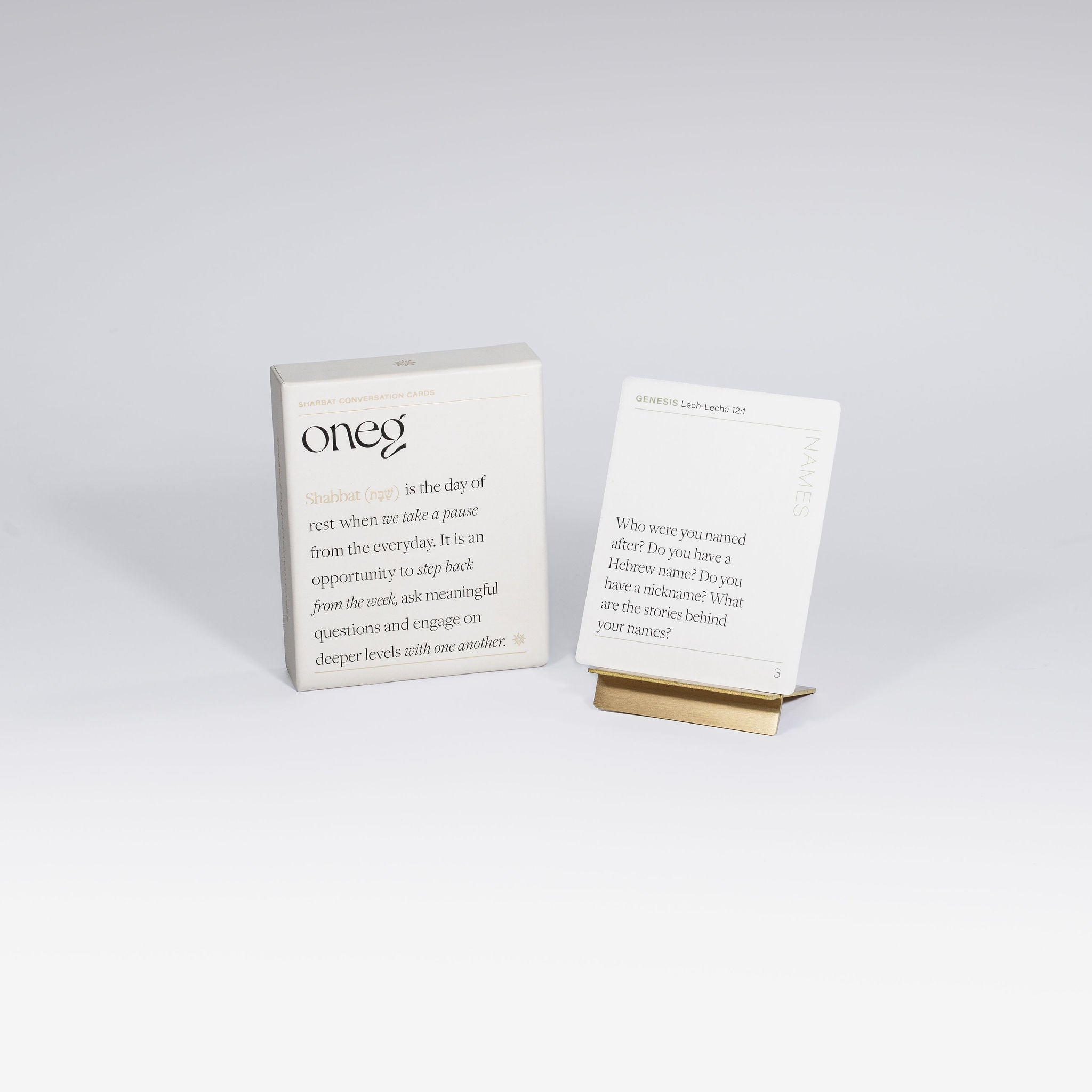 Shabbat conversation prompt cards with brass card holder by Oneg