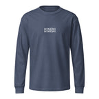 Front product mockup of Washed Navy Hineni Reflection garment-dyed heavyweight long-sleeve tee featuring mirrored Hineni artwork