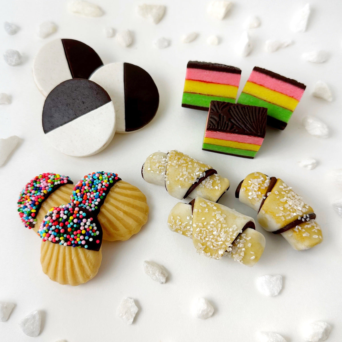 Handcrafted marzipan black and white cookies, rainbow cookies, rugelach and sprinkle cookies