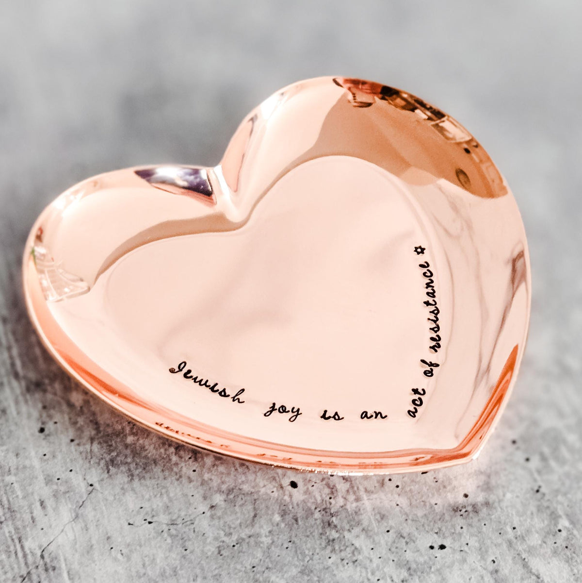 Heart-shaped trinket dish hand-stamped with Jewish Joy Is an Act of Resistance