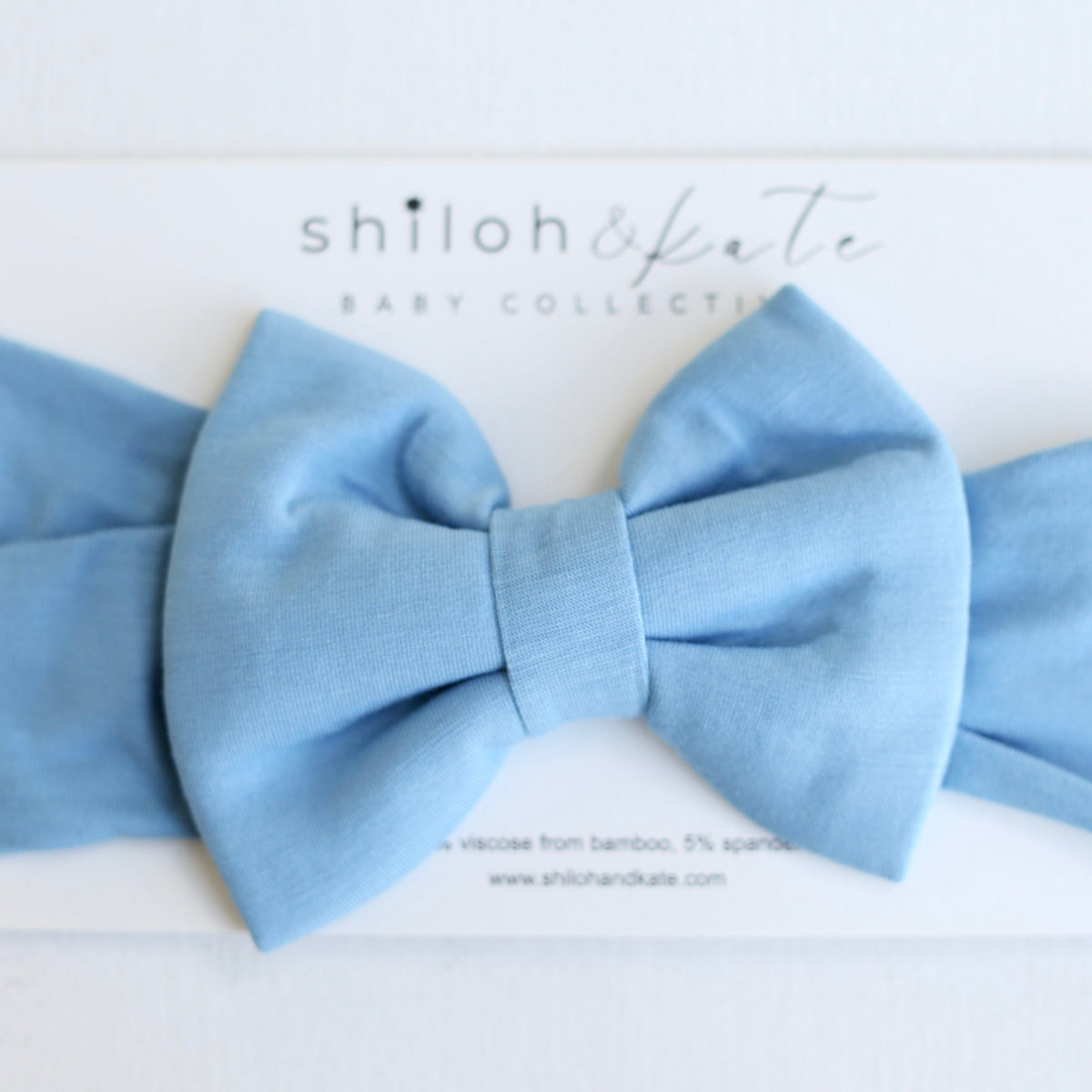 Blue Latkes & Light Hanukkah Bow by Shiloh & Kate made from soft bamboo viscose fabric.