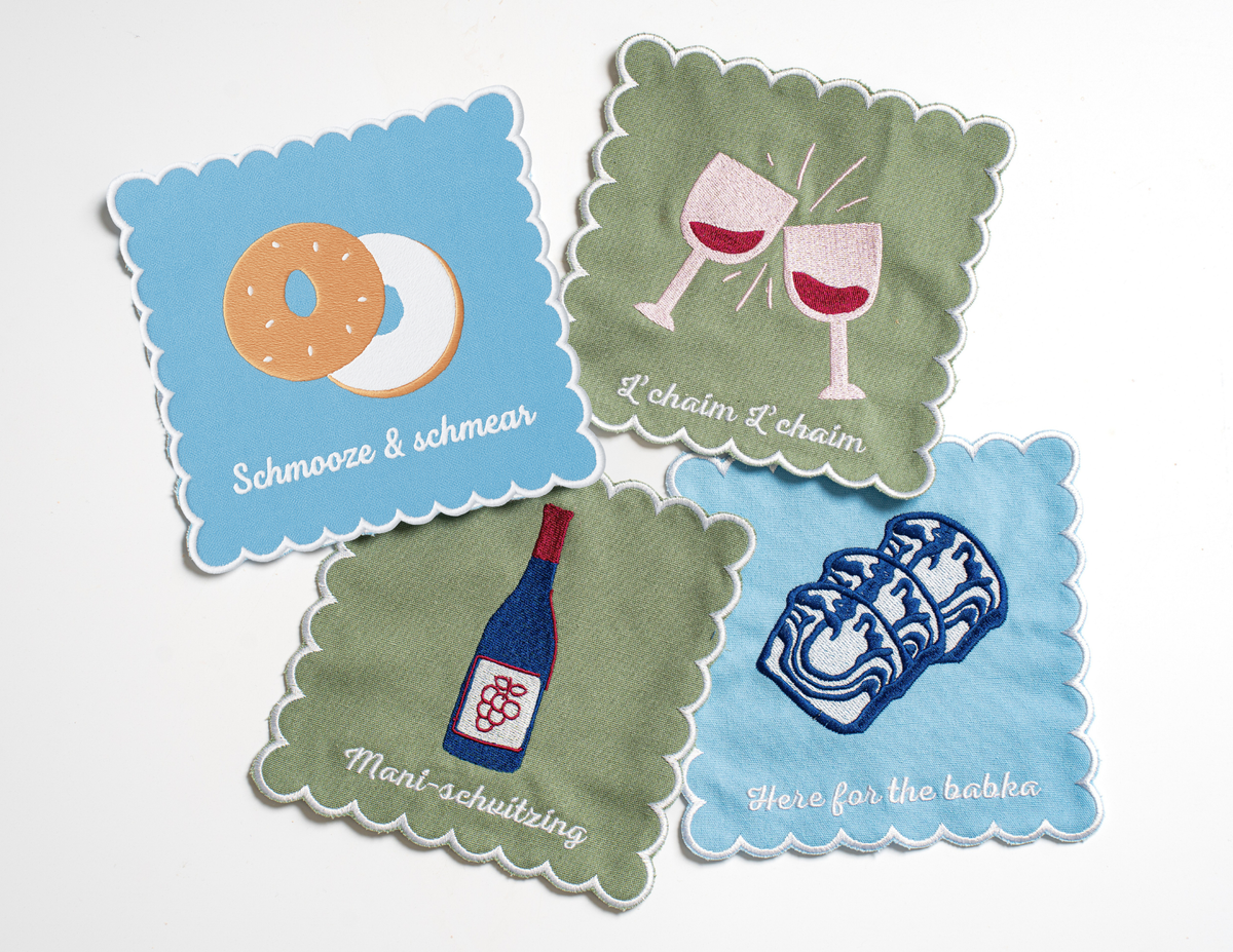 Set of four embroidered Jewish cocktail napkins with L’Chaim, Schmooze & Schmear, Here for the Babka and Mani-Schvitzing sayings.