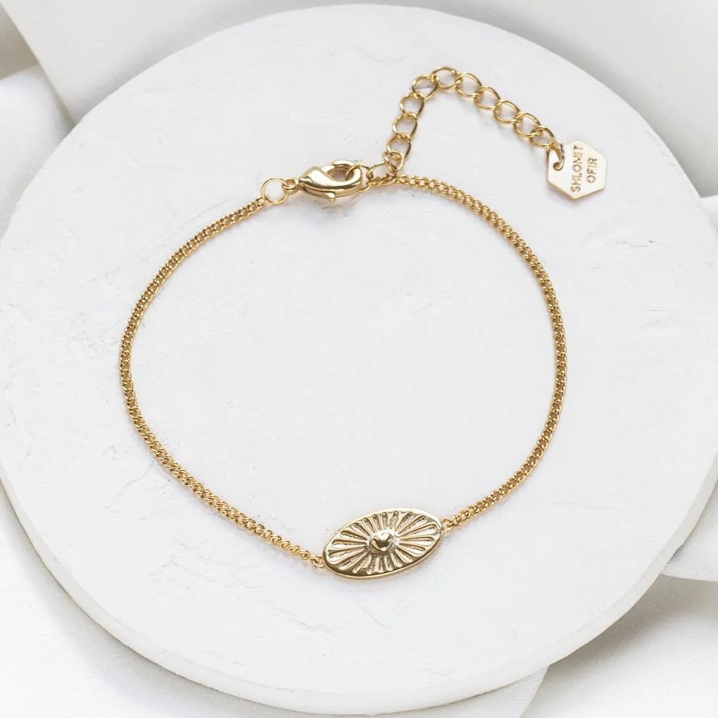 Gold Lenox Evil Eye Bracelet with textured oval and heart center by Shlomit Ofir