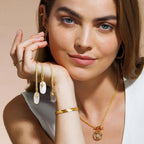 Model holding Long Mystic Necklaces in assorted stones by Shlomit Ofir