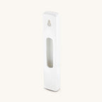 Back of Love Lives Here white ceramic mezuzah case showing opening for a scroll