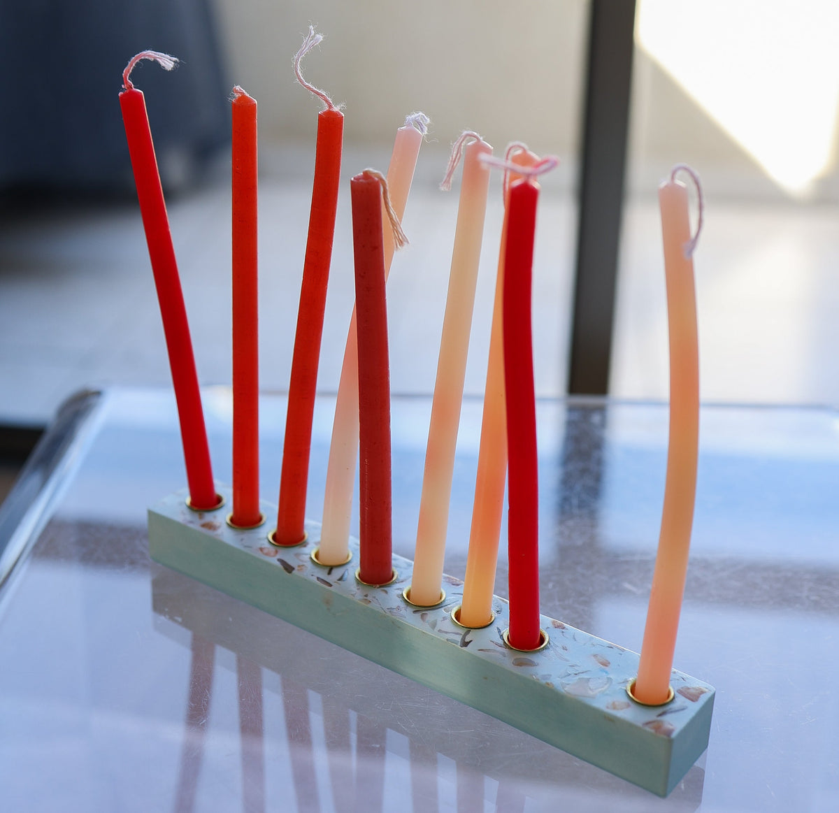 Blue Hanukkah menorah with shells collected from Israeli beaches by Made by Dalia