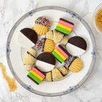 Assorted marzipan Jewish cookies arranged on a dessert plate