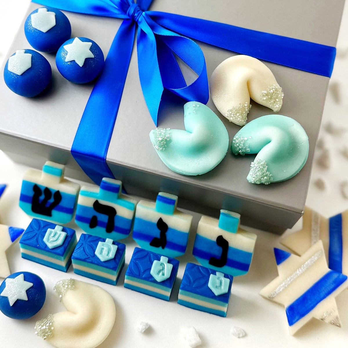 Hanukkah Elegant Gift Box with blue and white marzipan dreidels, Stars of David, fortune cookies, and rainbow cookies
