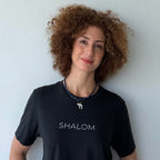 Monica Czukerberg wearing the Shalom Minimalist Hebrew T-Shirt in Vintage Black