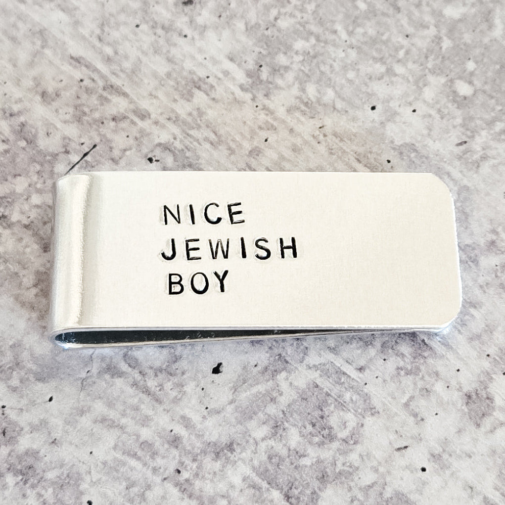 Silver money clip hand-stamped with NICE JEWISH BOY lettering by Salt Sparkle Shalom.