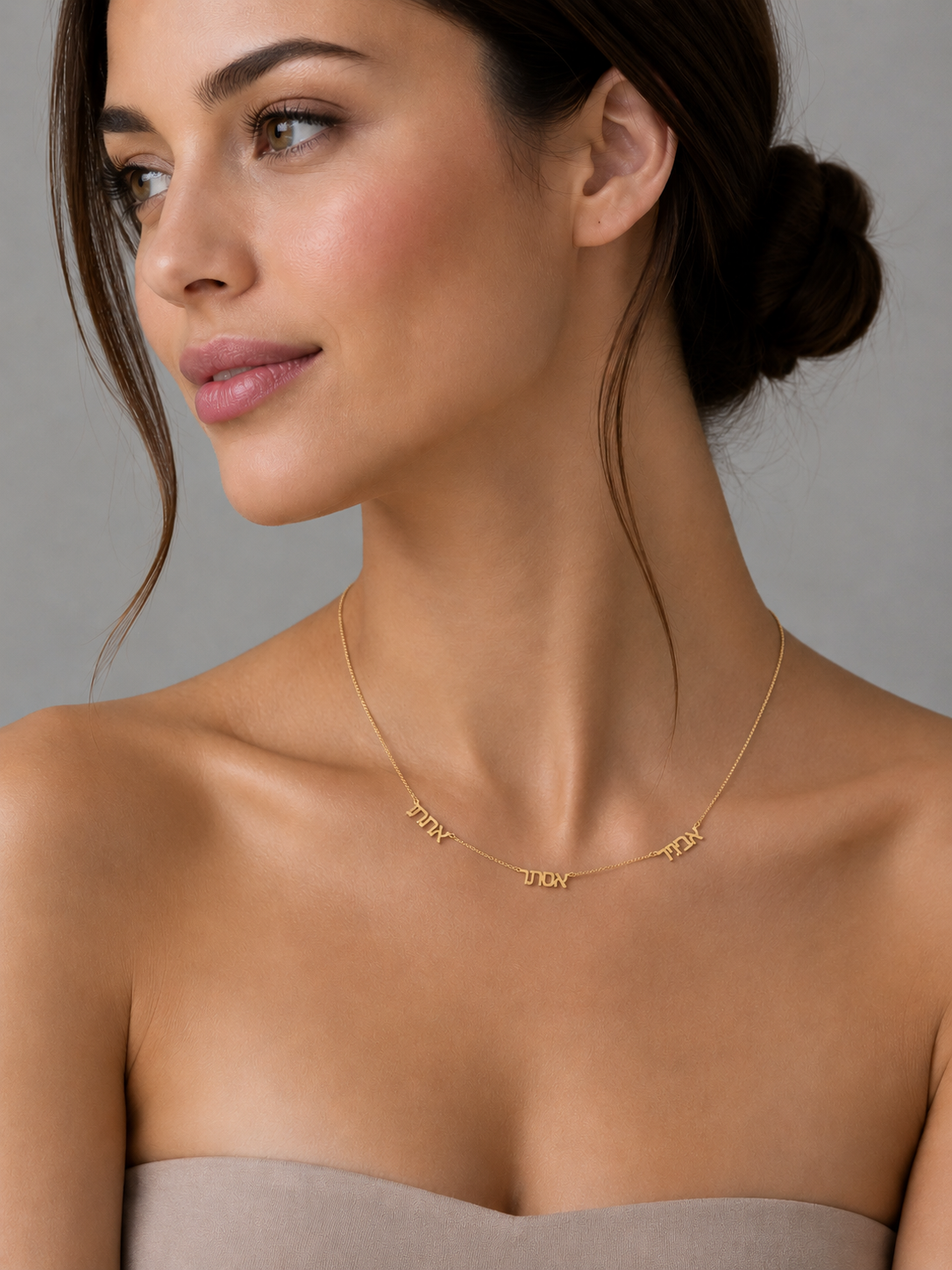 Personalized Hebrew name necklace worn at the collarbone