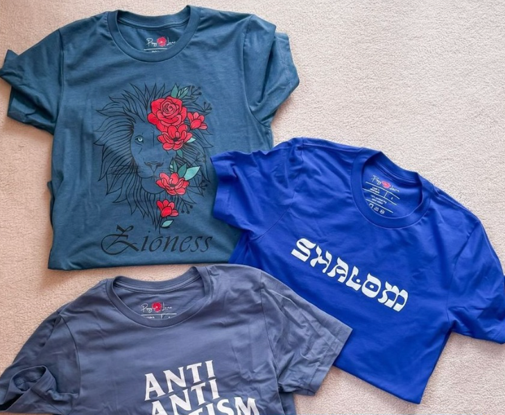 A collection of Poppy Lane original tees.