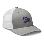 I’m That Jew™ Retro Trucker Hat in heather grey and white with navy embroidery, angled view, by Eitan Chitayat