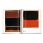 Rothko art book open to two Mark Rothko paintings in black, red, and orange