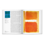 Rothko art book open to a large orange and white Mark Rothko painting