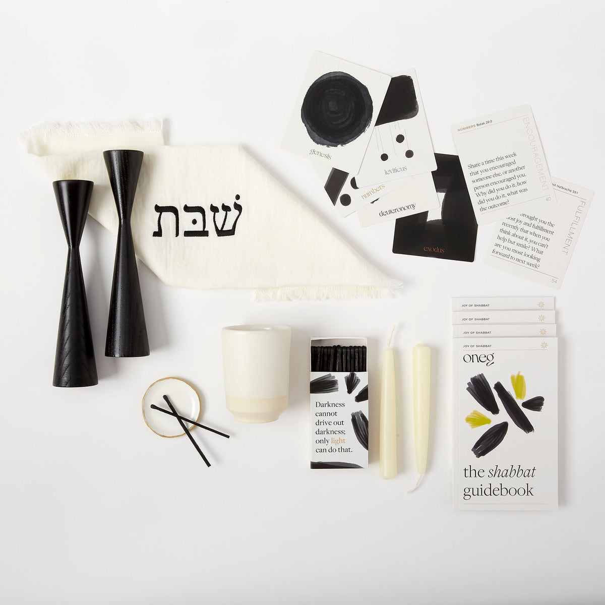 Signature Shabbat Box with White Linen challah cover, Black candlesticks, Kiddush cup, candles and Shabbat guidebook by Oneg
