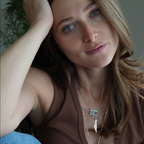 Woman wearing sterling silver Israel Map Pendant Necklace layered with other necklaces