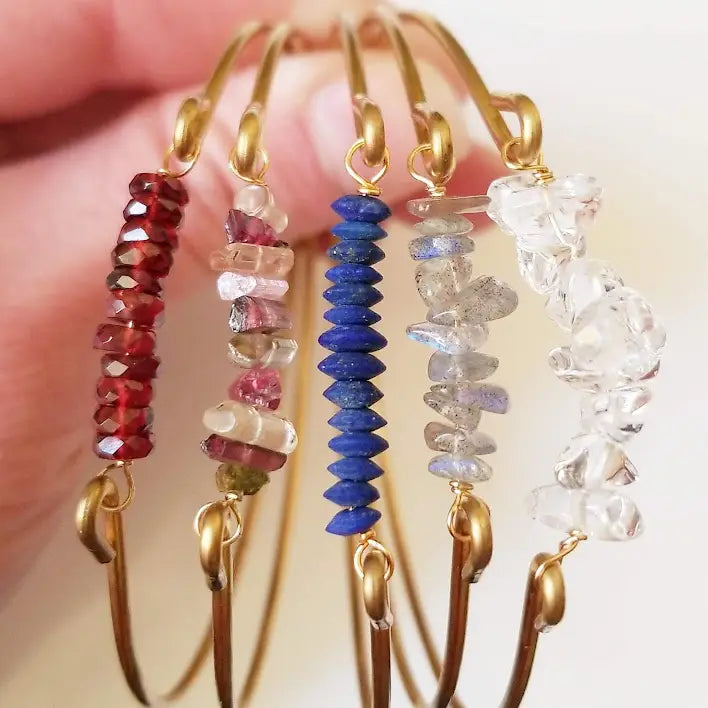 Stackable Gemstone & Brass Bangles by Sara Sela in assorted natural gemstones
