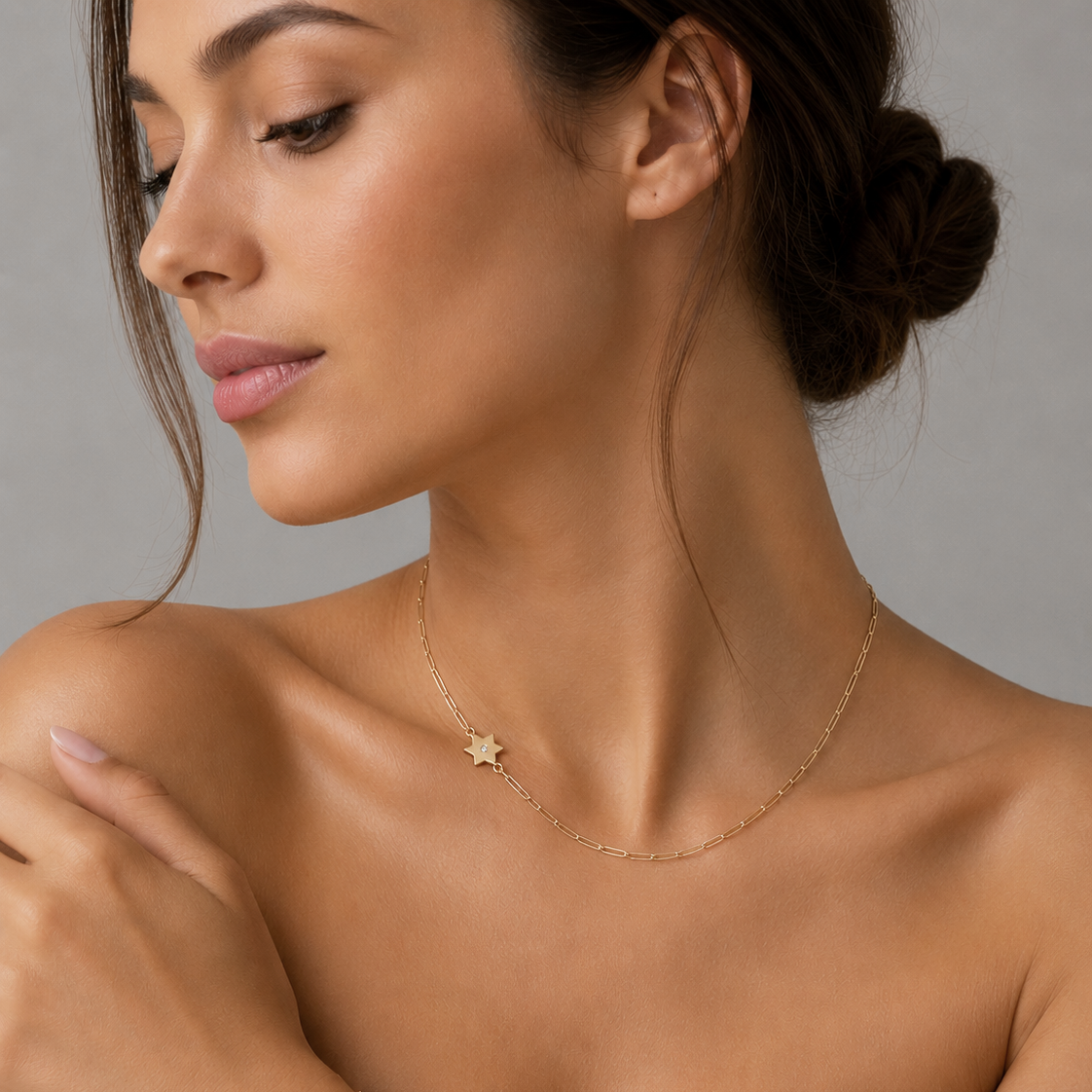 Asymmetrical Star of David Paperclip Necklace worn by a woman