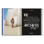 The Star Wars Archives book open to Luke Skywalker on Tatooine and the Episodes I–VI title page